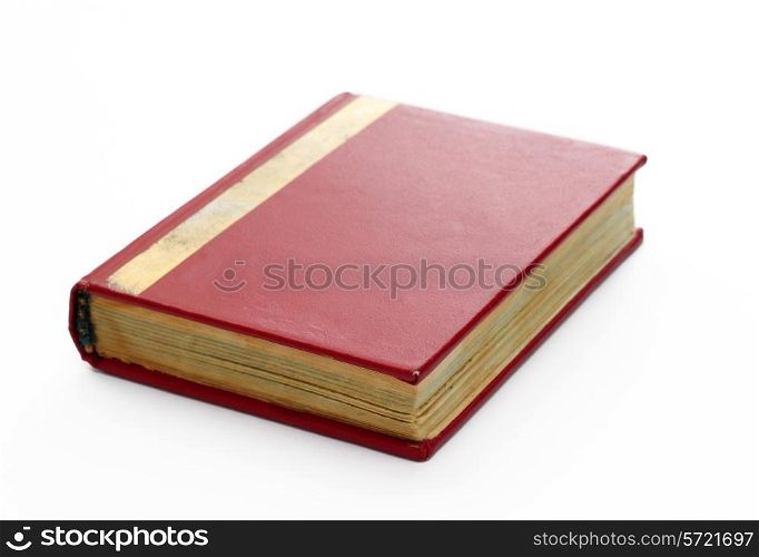 Red note book on white background.