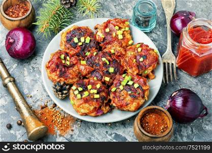 Red onion cutlets.Diet food.Onion cutlets.Healthy food or vegetarian. Dietary onion cutlets