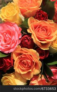 Red, orange and yellow roses in a mixed rose bouquet