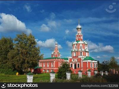 Red orthodox curch in Sofrino village, Russia