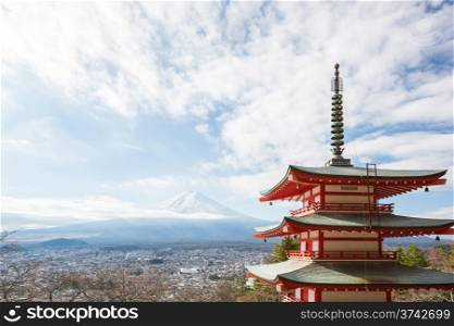 Red pagoda with Mountain Fuji landscape and Yamanashi city as the background