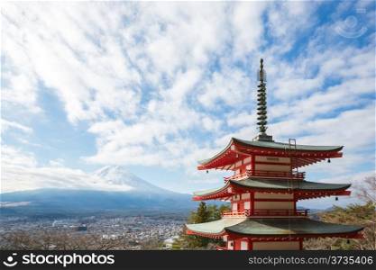 Red pagoda with Mountain Fuji landscape andYamanashi city as the background