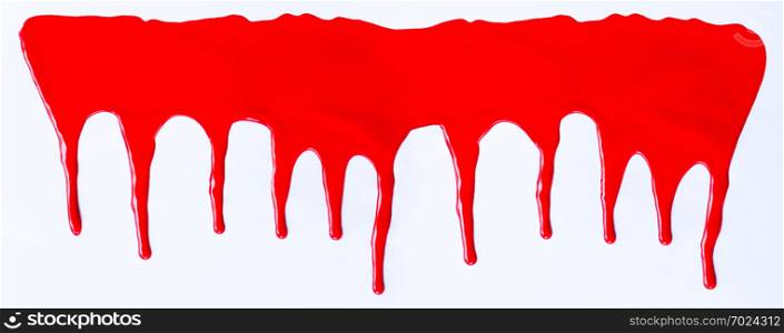 Red paint dripping on a white background