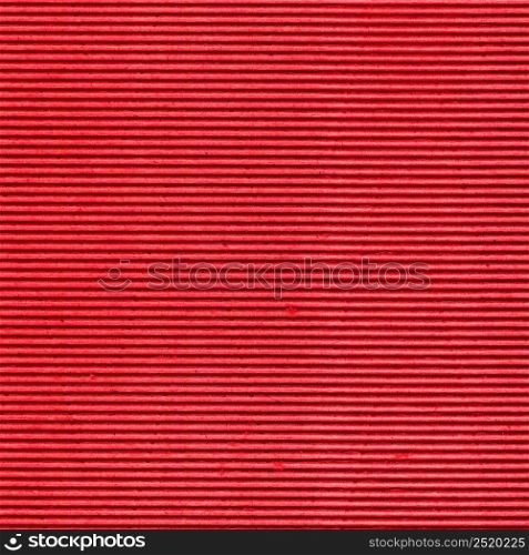 red paper cardboard texture useful as a background. red cardboard paper texture background