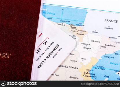 Red passport with a ticket on the map. Map with passport and ticket. Travel concept
