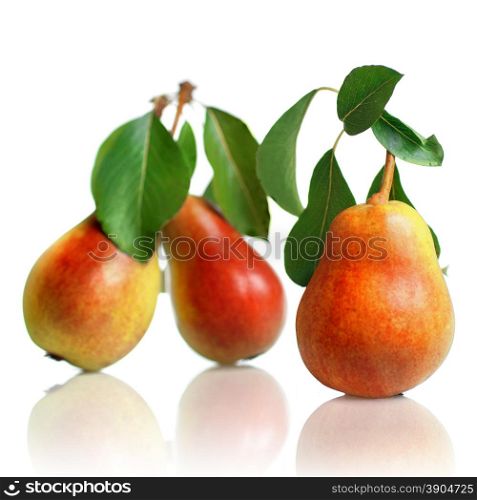 red pears with leaves isolated on white