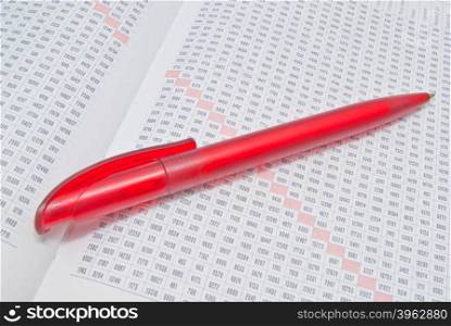red pen and diary close-up on white