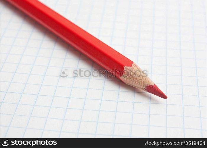 red pencils and notebook