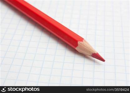 red pencils and notebook