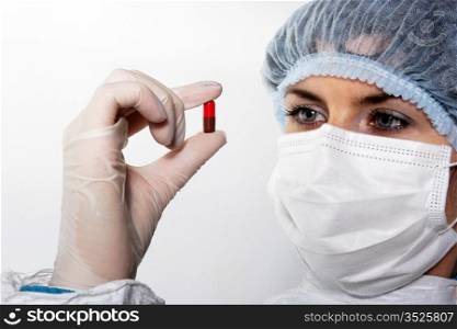 red pill in his hand the doctor