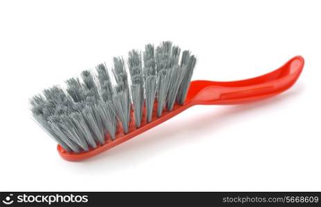 Red plastic cleaning brush isolated on white