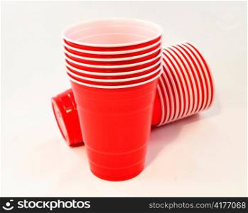 red plastic cups on white background