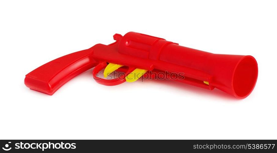 Red plastic toy gun isolated on white