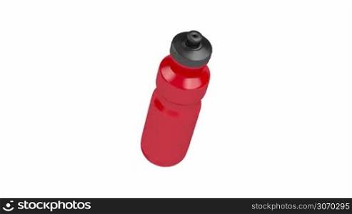 Red plastic water bottle spin on white background