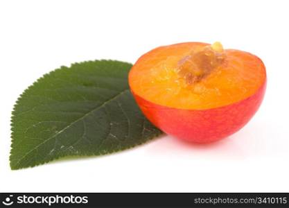 Red plums isolated on a white background .