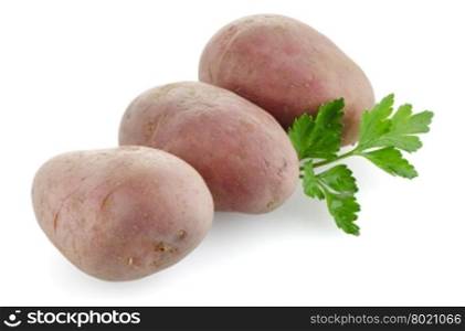 Red potatoes on white reflective background.