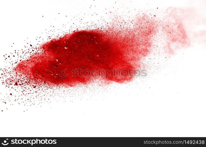 Red powder explosion on white background. Colored cloud. Colorful dust explode. Paint Holi.