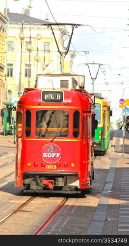 Red pub tram in the capital of Finland, Helsinki