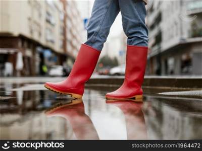 red rain boots street. High resolution photo. red rain boots street. High quality photo
