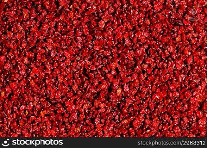 Red raisins isolated on the white background