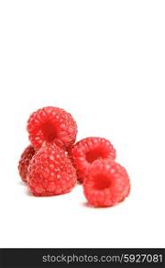 Red raspberries on white background
