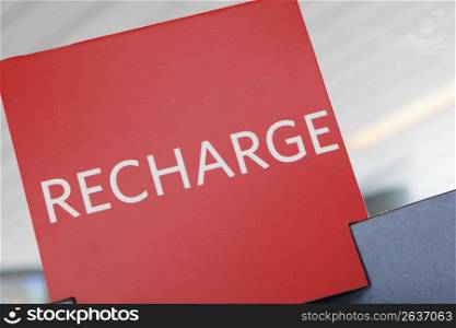 Red recharge sign