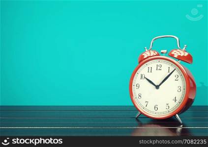 Red retro alarm clock on blue background with vintage filter, 3D rendering