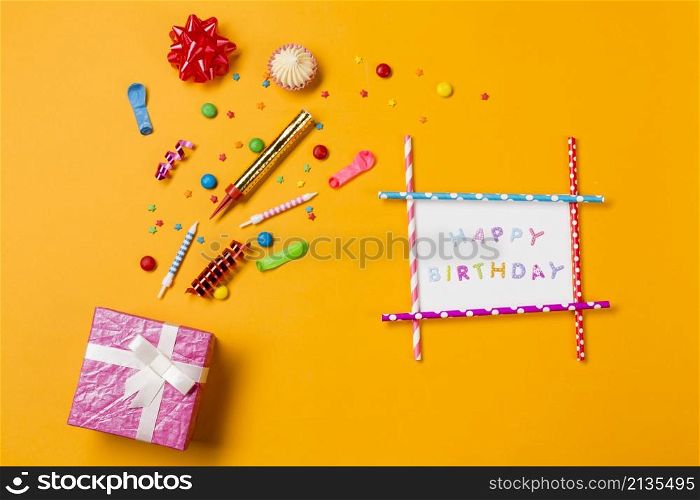 red ribbon bow aalaw gems streamers sprinkles with happy birthday card gift box yellow backdrop