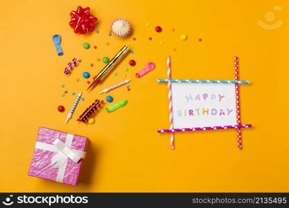 red ribbon bow aalaw gems streamers sprinkles with happy birthday card gift box yellow backdrop