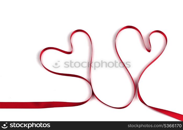 Red ribbon heart isolated on white background