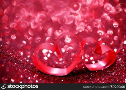 Red ribbon hearts on glitter background, Valentines day concept
