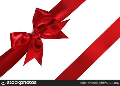 Red ribbon with bow isolated on white background