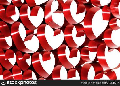 Red ribbons shaped as hearts on white background. Red ribbon hearts