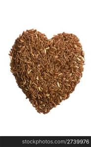 Red rice in heart shaped on white