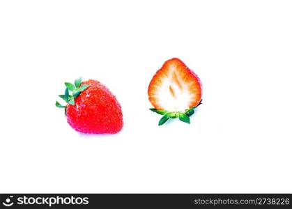 Red ripe strawberry fruits on a white background