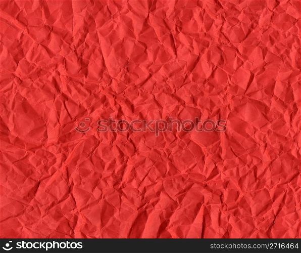 Red rippled paper background useful for Christmas greeting card. Red Christmas background