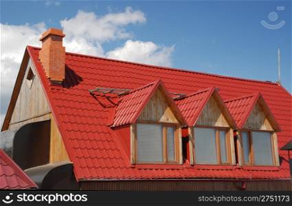 Red roof. A cottage constructed highly in mountains