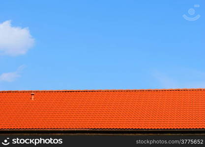 red roof and blue sky