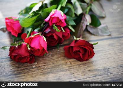 Red rose flower bouquet / Pink and red roses Valentines day love on wooden table nature background for lover concept