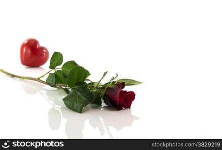 red rose with heart shape isoalted on white