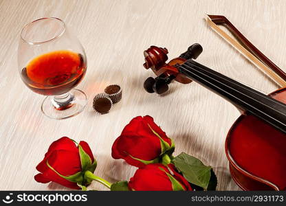 Red roses and a violin