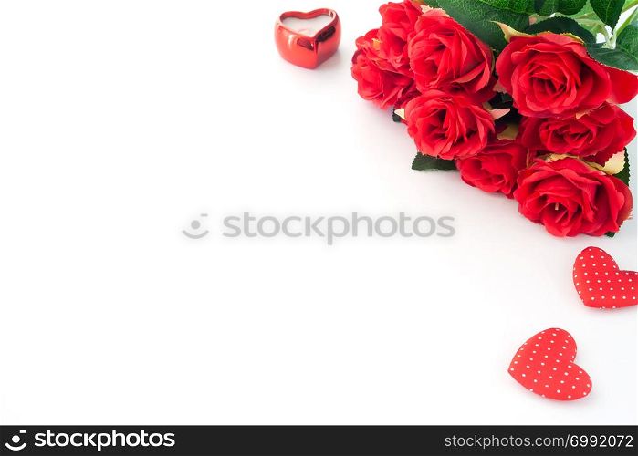 Red roses and heart on white background