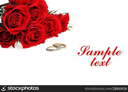 red roses and ring isolated on white with copy space