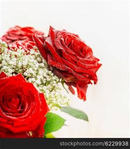 Red roses on light background, close up, side view, Festive roses bouquet