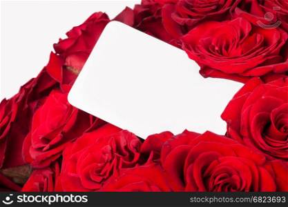 Red roses with a blank gift tag. Red roses with a blank gift tag