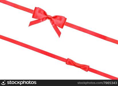 red satin bow and knot and two diagonal ribbons isolated on horizontal white background