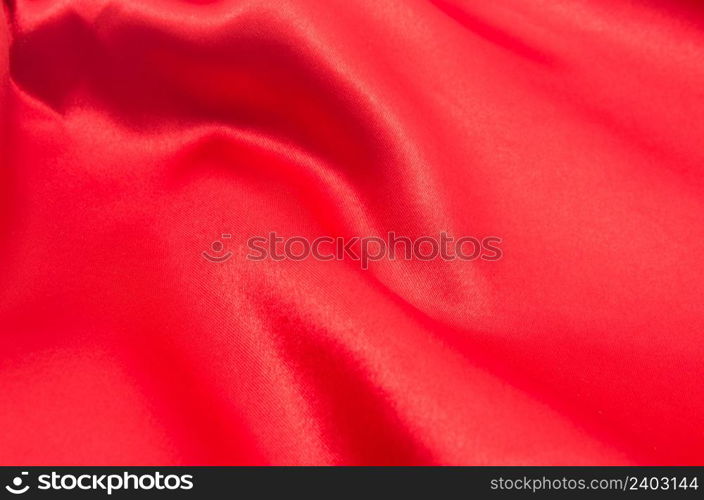 red satin or silk fabric as background