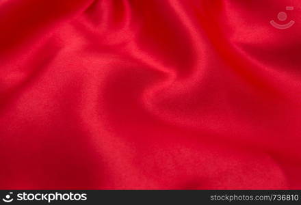 red satin or silk fabric as background