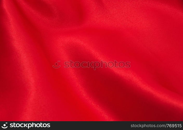 red satin or silk fabric as background