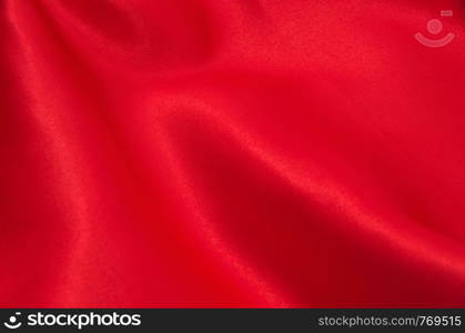 red satin or silk fabric as background